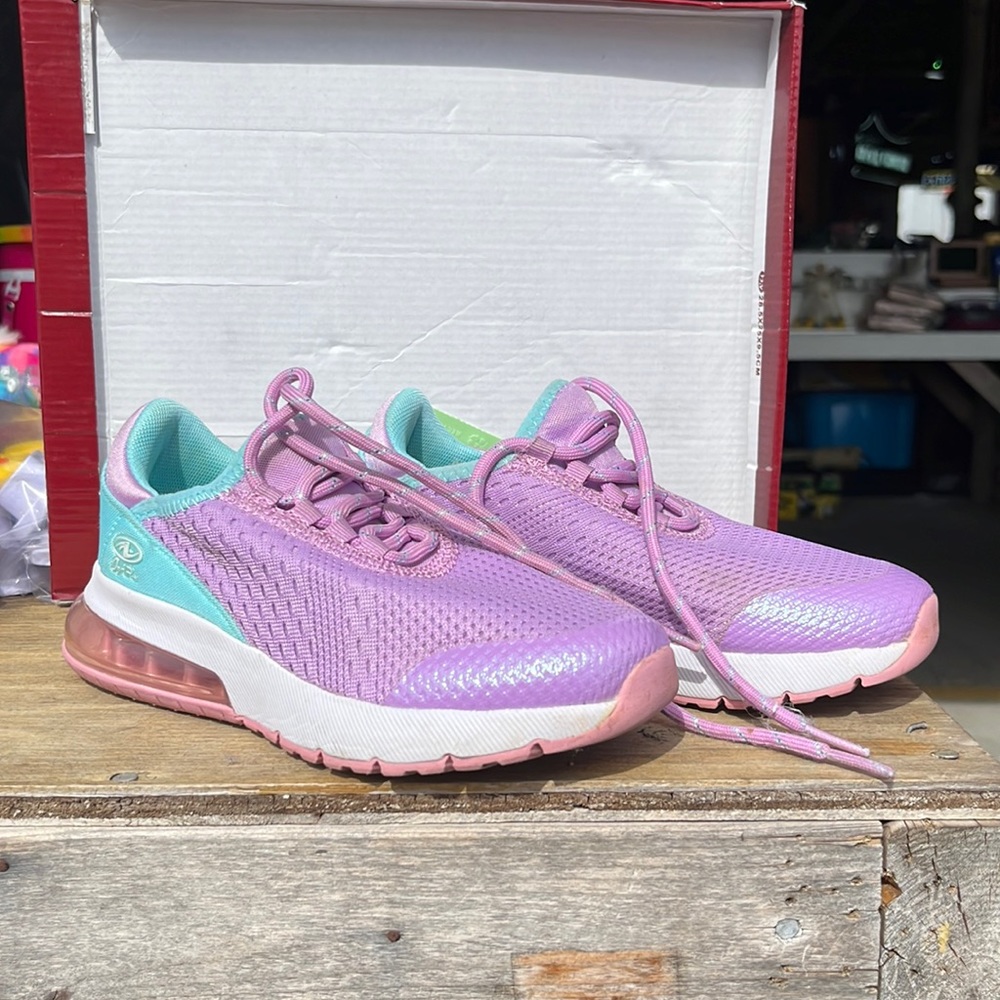 Worn once . Turquoise and purple sneakers